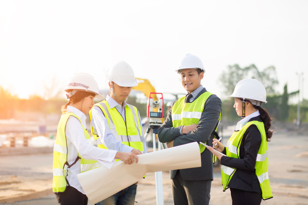 Asian,Construction,Engineer,asian,Secretary,And,Asian,Foreman,Worker,Checking,Construction